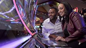 Filipino player enjoying ph 32 live casino on a mobile phone at home